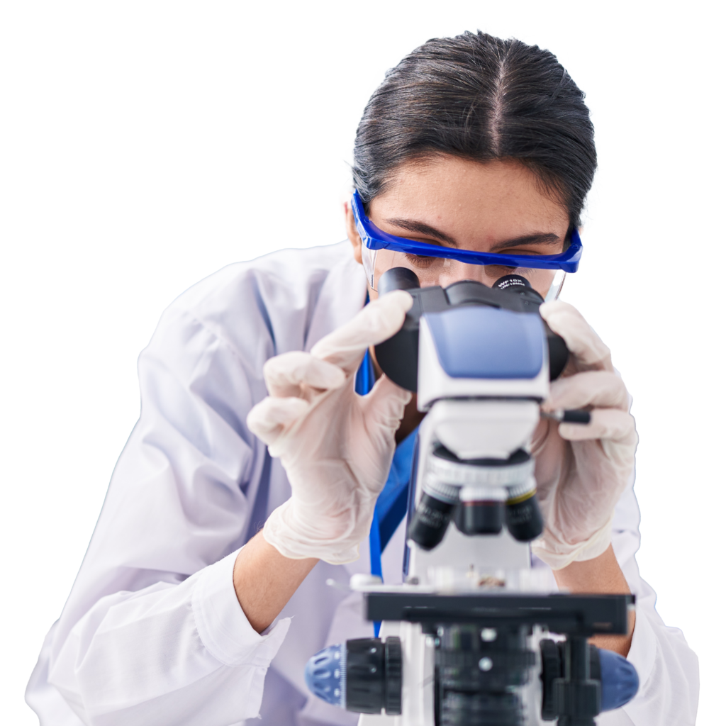 Woman scientist looking down microscope.