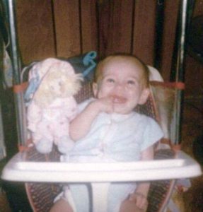 Image of Stephanie as a baby.